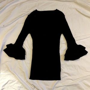 Soft ribbed knit long sleeve w ruffle hem sleeves- stretches to fit form